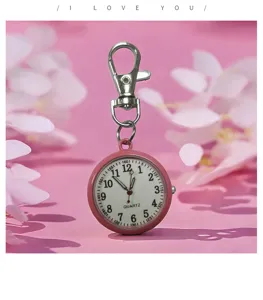 Pink quartz pocket watch keychain portable nurse watch detail view cute accessory style.