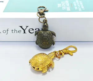 Vintage turtle pocket watch keychain, cute animal pendant quartz watch with bronze and gold finish.