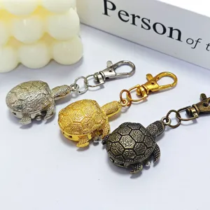Cute turtle pocket watch keychains set featuring silver gold and bronze vintage quartz timepieces.