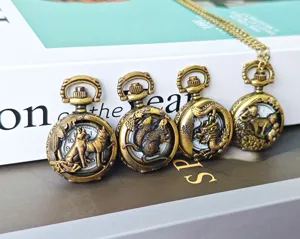 Detailed view of vintage bronze Chinese zodiac pocket watches featuring carved relief.