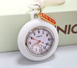 Silicone nurse fob watch detail view, quartz movement with clear dial and lucky exam charm.