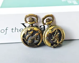Vintage bronze zodiac pocket watch with intricate hollow carved rat and dragon motifs for gifts.