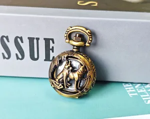 Vintage bronze pocket watch with exquisite hollow animal carving design, classic retro gift.