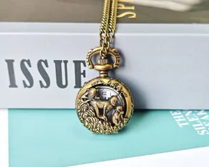 Bronze vintage zodiac monkey pocket watch necklace detail shot, retro carved pendant close-up