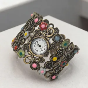 Vintage ethnic flower bracelet watch for women, stylish quartz bangle wrist watch.