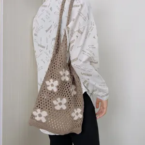 Brown crochet tote bag with white flower patterns, casual knitted shoulder bag for women.