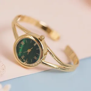 Élégante montre bracelet jonc dorée pour femme cadran vert montre à quartz bijou de mode cadeau