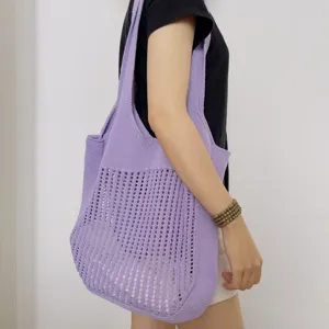 Lila gestrickte Netz-Tasche für Damen, lässige hohle Umhängetasche, stilvolle Freizeittasche.