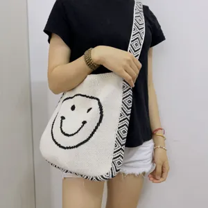 Gestrickte Smiley Schultertasche lässige schwarz-weiße Umhängetasche für Damen Alltag Mode