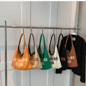 Gestrickte Umhängetasche für Damen, Retro Buchstaben gewebte Handtasche Freizeit Tasche.