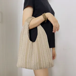 Knit geometric shoulder tote bag, casual underarm knitted handbag for women detail view.