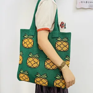 Detailed view of vintage knit pineapple tote bag, showcasing large capacity and stylish shoulder design.