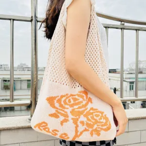Gestrickte hohle Tragetasche für Damen mit stilvollem Rosenmuster, lässige Schultertasche.