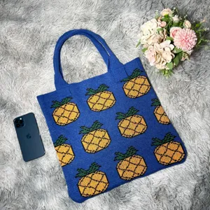 Blue knitted tote bag with yellow pineapple pattern, casual large capacity shoulder handbag.