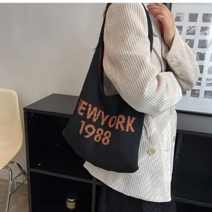 Vintage Damen Strick Umhängetasche, schwarze Stricktasche mit Buchstaben, lässige Handtasche.