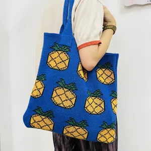 Stylish blue knit tote bag for women featuring cute yellow pineapple pattern large capacity.