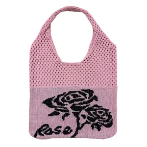 Rosa Strick Netztasche mit schwarzem Rosenmuster, lässige hohle Strick Handtasche Detailansicht.