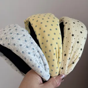 Details of the Korean style wide fabric headband with star print, stylish daily hair accessory.