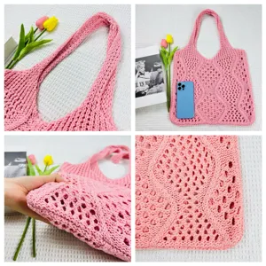 Rosa gestrickte hohle Tragetasche, stylische Strand-Schultertasche mit Netzmuster für Damen.