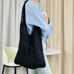 Schwarze gestrickte hohle Schulter-Tragetasche, lässige gewebte Strandtasche für Alltag.