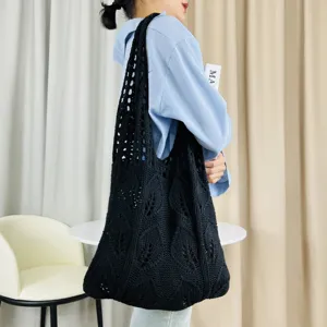 Schwarze Strick-Häkel-Umhängetasche für Damen, modische lässige geflochtene Handtasche.