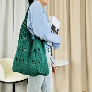 Grüne Strick-Tasche für Damen, lässige Häkel-Schultertasche mit Blattmuster für Alltag.