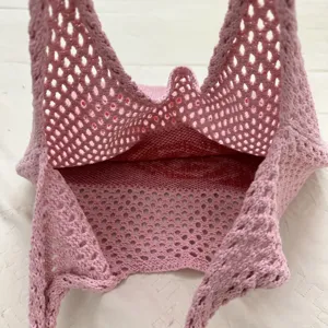 Rosa Strick Netztasche Innendetail Häkeln Lochmuster lässige Sommer Handtasche Strandtasche.