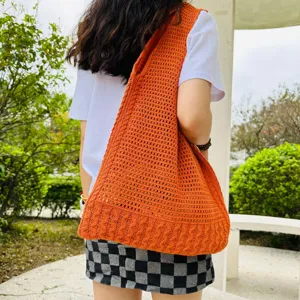 Oranger gestrickter hohler Schulter-Tote-Bag, lässige Damen-Handtasche für den täglichen Gebrauch.