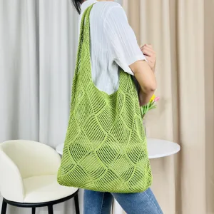 Grüne Häkel-Tragetasche, Strick-Umhängetasche, lässige hohle Strick-Strandtasche für Damen.