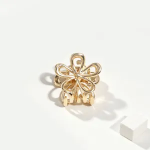 Mini molletta per capelli a fiore in metallo dorato, design floreale traforato per acconciature.