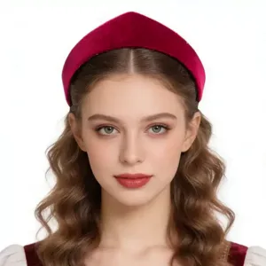 Close-up of wine red velvet padded headband, Baroque crown style hair accessory.