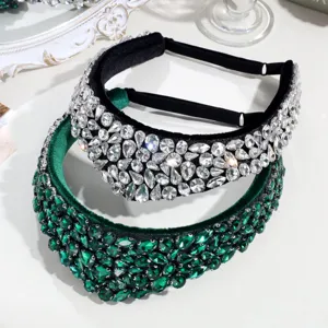 Detailed close-up of luxury Baroque crystal rhinestone headbands in clear and emerald green.