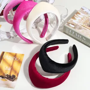 Detailed shot of thick velvet padded headbands in assorted elegant colors for women's daily wear.