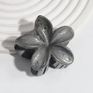 Grey plumeria hair claw clip, stylish flower shape hair accessories for women and girls daily wear.