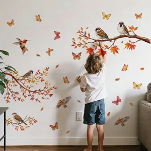 Detalle de vinilo adhesivo de pared de rama de árbol y pájaro de otoño para salón.