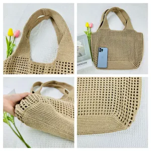 Detaillierte Ansicht der gestrickten Beuteltasche mit Griff, Netzstruktur und Boden.