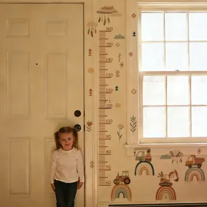 Detail view of cartoon engineering vehicle growth height chart wall sticker for kids room.