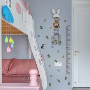 Detailed view of cute cartoon animal growth chart wall sticker in a children bedroom decor.