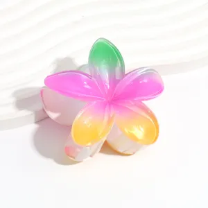 Colorful gradient plumeria hair claw clip jelly flower hairpin for summer fashion styling.