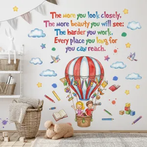 Detail view of colorful hot air balloon wall sticker with English inspirational quotes for kids room.