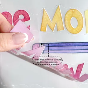 Detail shot of transparent wall sticker with self-adhesive backing showing easy peeling feature.