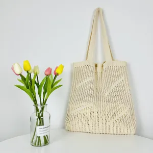 Beige knit hollow out tote bag, large capacity casual shoulder bag for daily use.