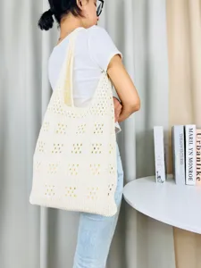 Beige Strick ausgehöhlte Umhängetasche Detail, lässige Strand Tote Tasche Alltag.