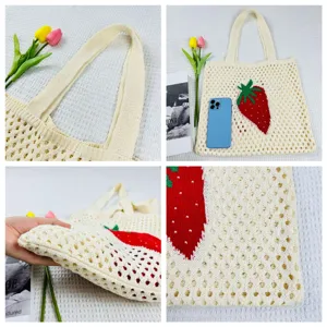 Gestrickte Erdbeer-Tragetasche für Damen, süße hohle Strandtasche, lässige gewebte Schultertasche.