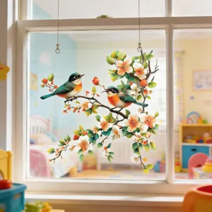 Vue détaillée d'un autocollant de fenêtre avec des oiseaux colorés et des branches.