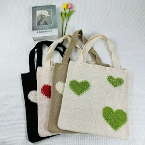 Gestreickte Tragetasche mit Herzmuster und Perlen, große lässige Schultertasche für Damen.