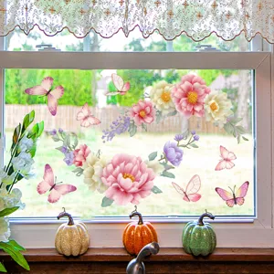 Detail shot of colorful floral and butterfly static window stickers displayed on glass window.