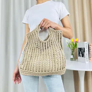 Sac cabas tissé en tricot beige, élégant sac de plage ajouré pour femmes au quotidien.