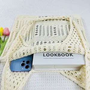 Beige gestrickte hohle Tragetasche, lässige Strand-Umhängetasche für den täglichen Gebrauch.
