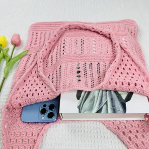 Modische rosa gestrickte ausgehöhlte Umhängetasche, lässige Strand Häkel Handtasche für Damen.